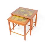 A Danish teak duetto of occasional tables, tile inset, largest 49cm wide, 40cm deep, 46cm high.