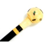An ebony walking stick, with ivory collar and ball knop, Shibayama decorated with insects, ivory