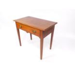 A George III oak side table, with single frieze drawer, raised on tapering square legs, 83cm wide,