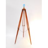 A Lancaster plate camera oak tripod stand converted to a standard lamp, 128.5cm high.