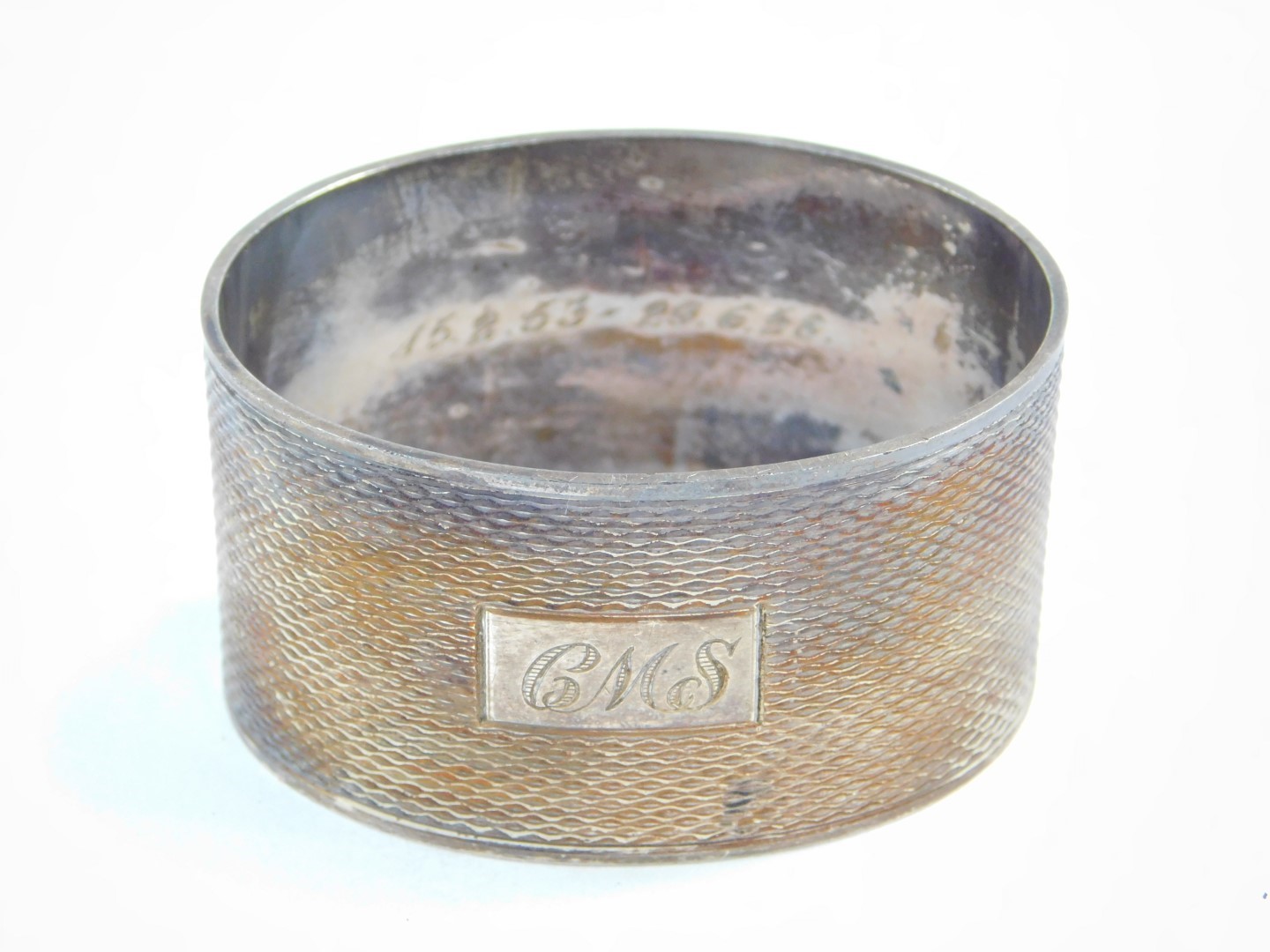 A silver napkin ring, with engine turned decoration, rectangular reserve monogram engraved, London - Image 6 of 9