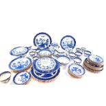 A Booths pottery part dinner tea and coffee service, decorated in the Real Old Willow pattern,