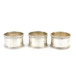 Three Edward VII silver napkin rings, Chester 1907, 4.98oz.