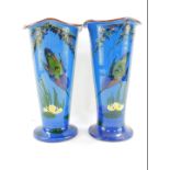 A pair of Longpark Torquay glazed terracotta vases, early 20thC, painted with kingfishers against
