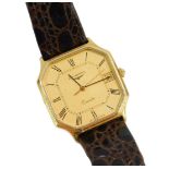 A Longines gentleman's gold wristwatch, gold octagonal dial bearing Roman numerals, centre