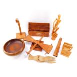 A group of treen, including a carved Indian stationery rack, 31cm wide, banana stand and fruit bowl,
