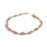 A 9ct rose gold and lilac semi-precious stone set multi link bracelet, on a bolt ring clasp, 3.6g.
