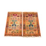 A pair of Egyptian Gabbeh Rug Collection rugs, decorated with nomadic tarantula type motifs and