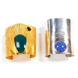 A Julia Booth silver and enamel modernist cuff, 88g, and a gilt and cabochon cuff. (2)