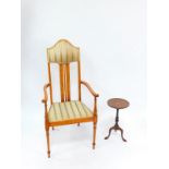 A Victorian mahogany and ivory line inlaid carver chair, with upholstered head rest and seat, raised
