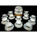 A Coalport porcelain tea service decorated in the Pageant pattern, comprising cream jug and sugar