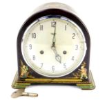 A Smiths Enfield brown Bakelite and japanned lacquered mantel clock, silvered dial bearing Arabic