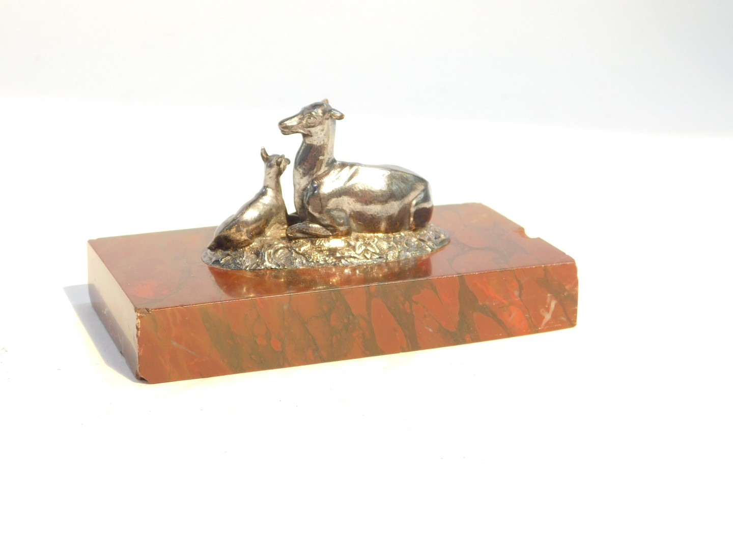 A Victorian paperweight cast as a recumbent doe and fawn, white metal, on a rectangular red marble - Image 3 of 5