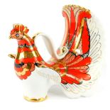 A Lomonosov porcelain decanter, modelled as a firebird, in red, black and gold, printed mark,