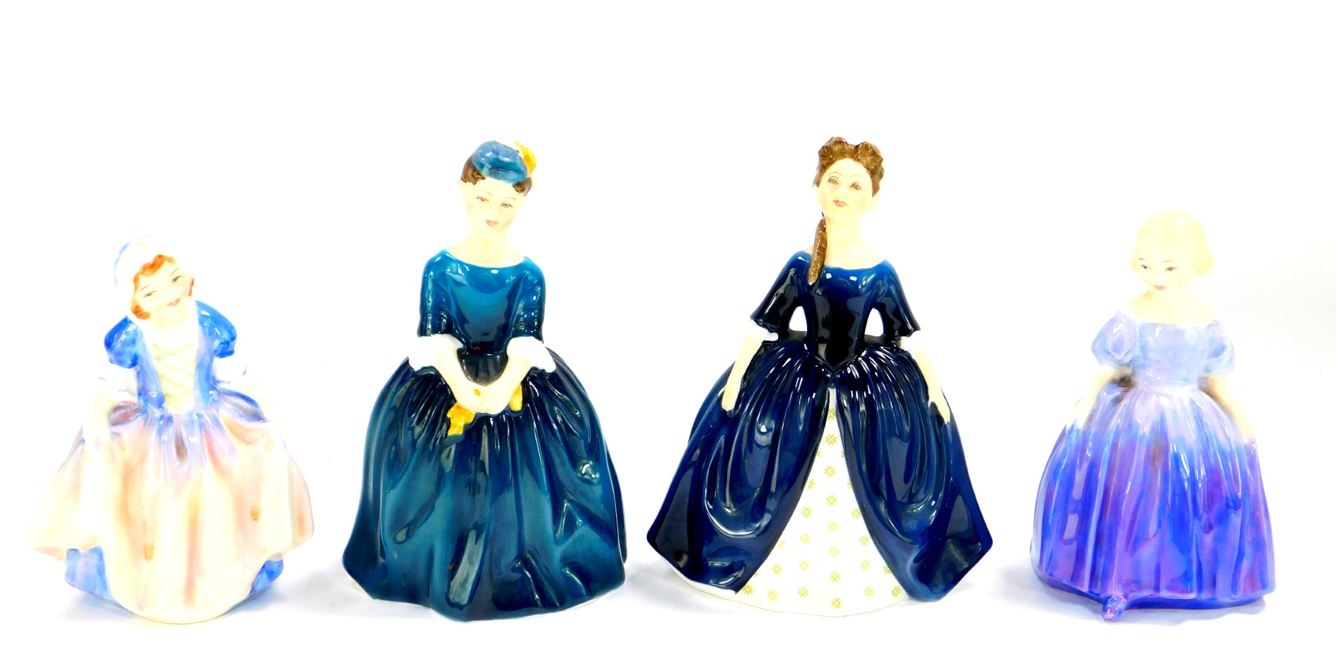 Four Royal Doulton porcelain figures, comprising Dinky Do HN1678, Debbie HN2385, Cherie HN2341,