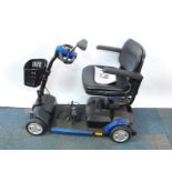 A QL Tech blue mobility scooter, model no QS0848, with battery and user manual.