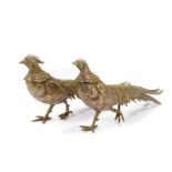 A pair of silver plated menu holders cast as pheasants, 27.5cm and 31cm long.