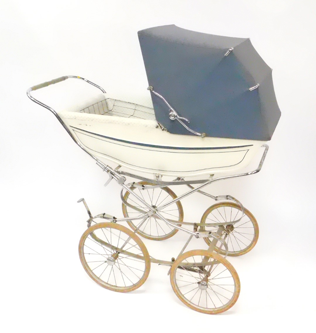 A Marmet coach built pram, with a blue trimmed white body, grey hood and blue floral interior