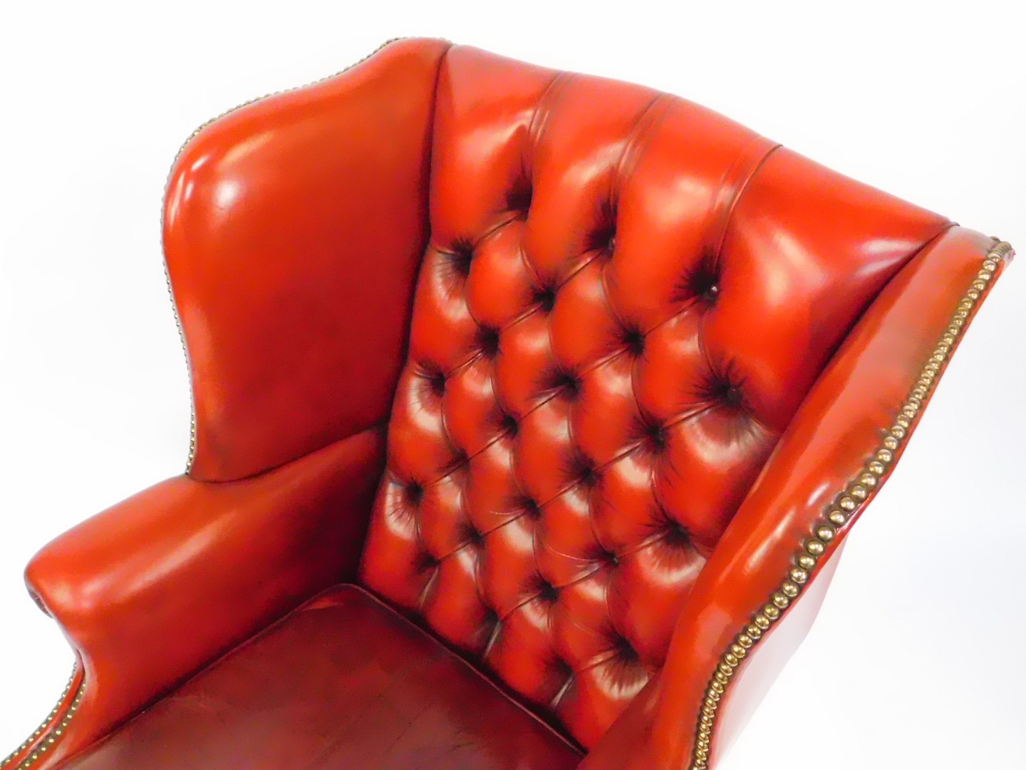 An oak framed red leather button back wing armchair, with loose cushion seat, and brass stud work, - Image 2 of 3