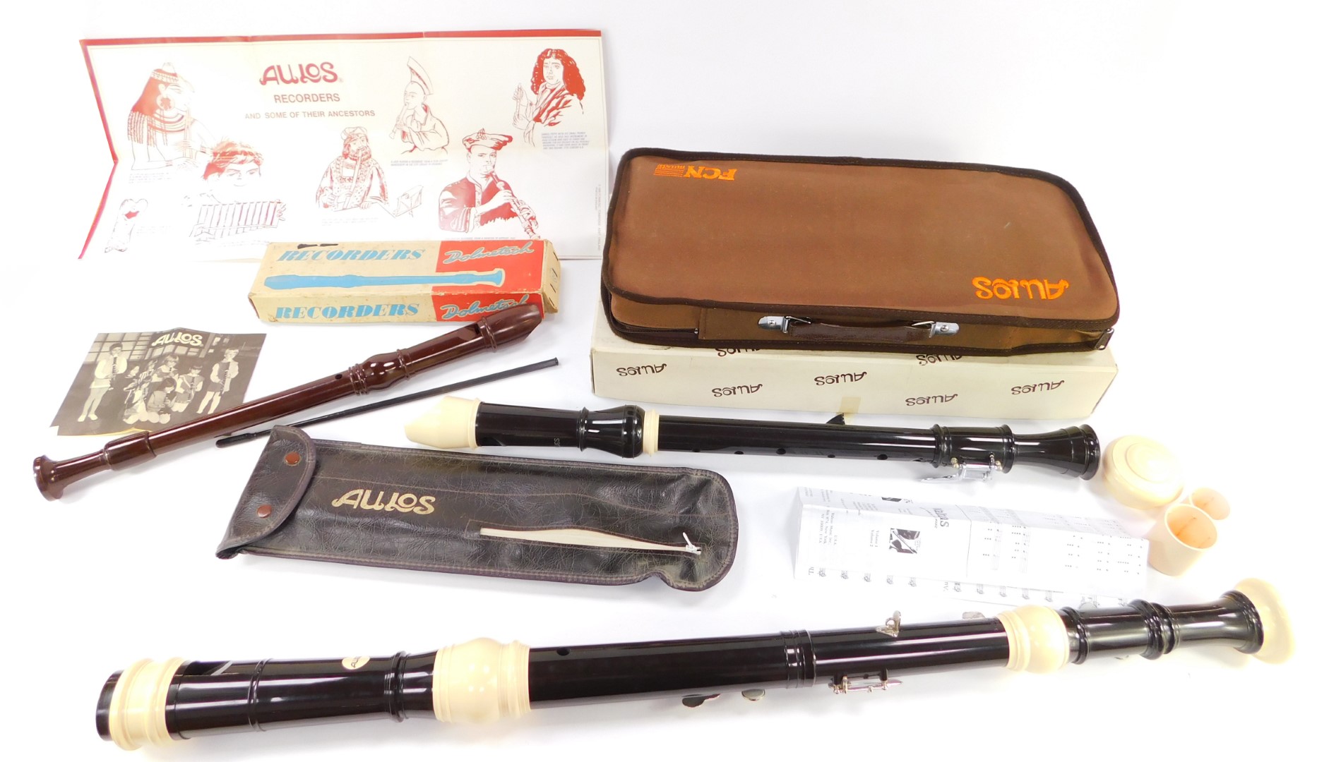 A Dolmetsch Treble Recorder, together with Aulos Tenor and Bass recorders, boxed and cased. (3)