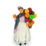 A Royal Doulton figure modelled as Biddy Penny Farthing, HN1843.