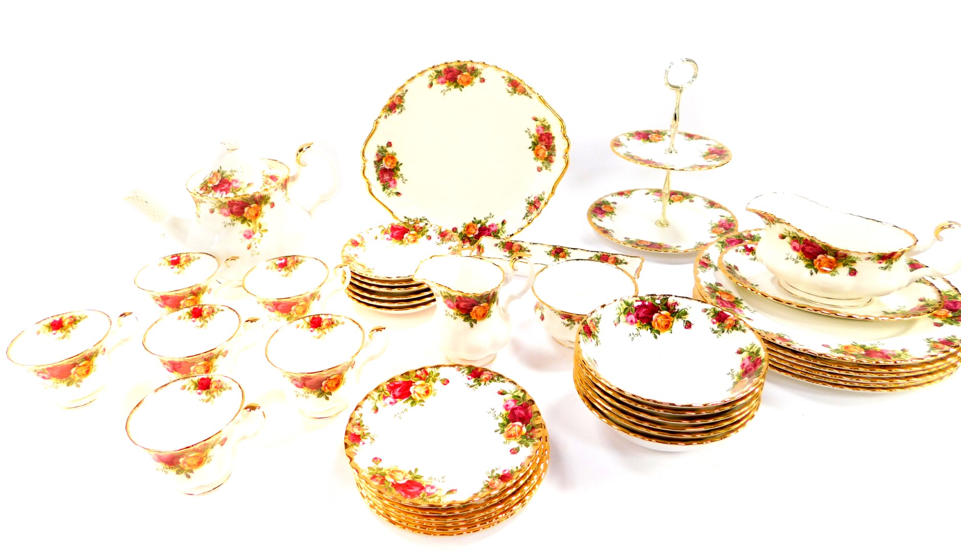 A Royal Albert porcelain part dinner and tea service, decorated in the Old Country Roses pattern,