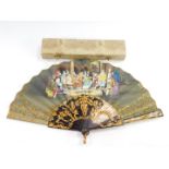 A Spanish 19thC silk and tortoiseshell fan, monogrammed LGC, painted with figures dancing with
