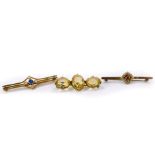 An Edwardian sapphire and seed pearl bar brooch, set in yellow metal, garnet and seed pearl bar