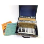 An Alvari piano accordian, 24 button, silver mother of pearl effect, cased.