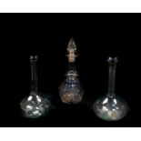 A Victorian cut glass decanter and stopper, with engraved decoration, 32cm high, together with a
