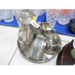 A pewter coffee pot, milk jug, sugar bowl, tankard, and a silver plated serving tray. (5)