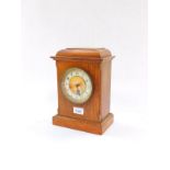 A Victorian 30 hour oak case mantel clock, with pendulum and key, 26.5cm high and 18.5cm wide.