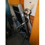 A Sports Art 1288 running machine, 152cm high.