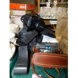 An Ilford Sportsman camera, Agfamatic pocket camera 4000, digital camera, and a Fujifilm Finepix