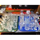 Two cut glass carafes and stoppers, two cut glass decanters and stoppers, brandy balloons and