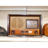 A Cossor Melody Maker walnut cased radio, model 520.
