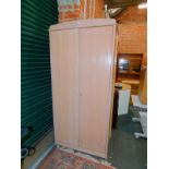 A Stag limed oak effect two door wardrobe, 208cm high, 101cm wide, 64cm deep.
