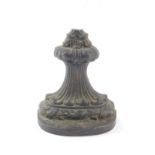 A Victorian cast iron door stop, 16cm wide.