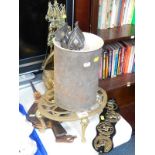 A brass coal bucket, fire irons, horse brasses bellow trivet, and Victorian doll furniture. (
