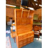 A Nathan bureau cabinet, 194cm high, 102cm wide, 45cm deep, together with a 1970s bentwood chair. (