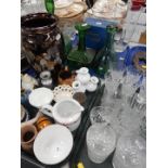 Ceramics and glass, including a green bottle and stopper, decanter, cut glass water jug, table