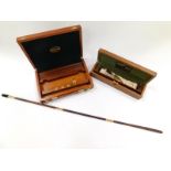 A Parker-Hale gun cleaning rod case, (AF), together with a Powell & Son gun cleaning rod set, cased.