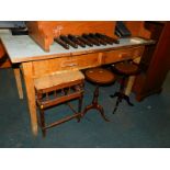 A 20thC pine kitchen table, with later Formica top, 77cm high, 138cm wide, 77cm deep, together