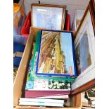 Jigsaw puzzles, prints, assorted books, etc. (2 boxes)