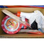 A Manchester United wall clock, two membership packs, and Ashes cricket bat, England musical