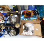 A brown Bakelite telephone, further telephone, and two boxes of radio valves.