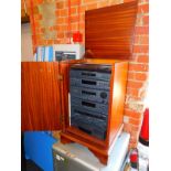 A Sony hi-fi system in a yew wood cabinet, LVT-D307, 76cm high, 47cm wide, 45cm deep.