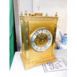 An Avia brass mantel clock, with silvered chapter ring bearing Roman numerals, Quartz movement, 22cm