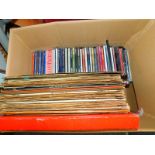 Rock and pop CDs, film DVDs and classical and easy listening records. (1 box)