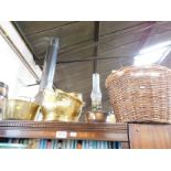 A Victorian brass coal bucket, brass jam pan, copper oil lamp, cane, log basket and an enamel